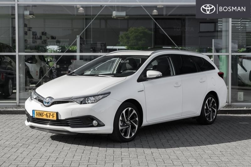 Wit Occasion 2016 Toyota Auris Hybrid Stationwagen | € 15.950 (Eerlijke prijs) - Afbeelding 1/4