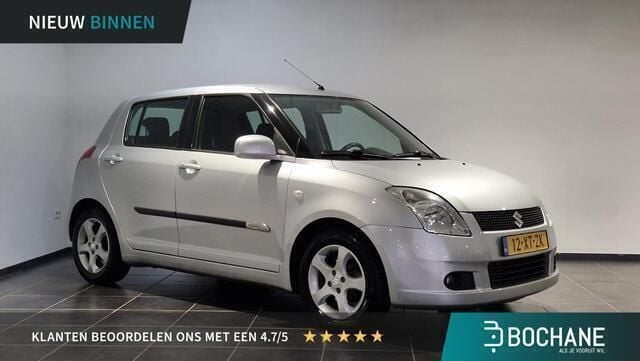 Grijs Gebruikt 2007 Suzuki Swift Exclusive Hatchback | € 6.945 (Eerlijke prijs) - Afbeelding 1/4