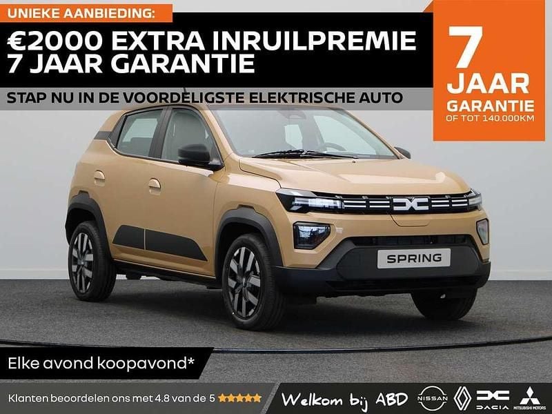 Bruin Nieuw 2025 Dacia Spring Expression Hatchback | € 21.675 - Afbeelding 1/3