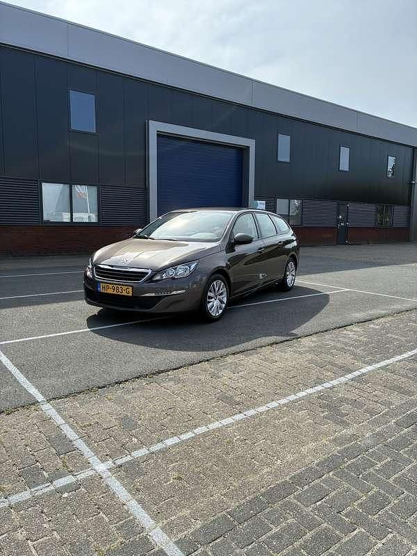 Grijs Occasion 2016 Peugeot 308 Stationwagen | € 6.990 (Eerlijke prijs) - Afbeelding 1/4