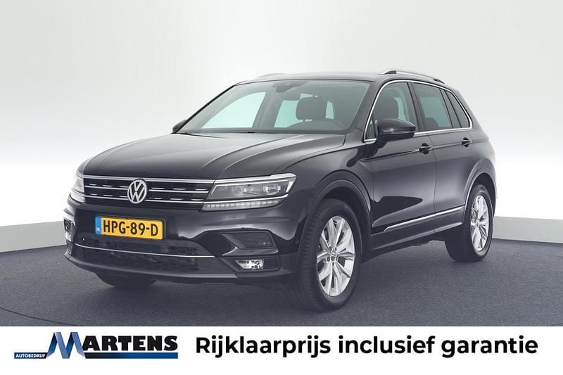 Zwart Gebruikt 2018 VW Tiguan Highline SUV | € 25.949 (Goede deal) - Afbeelding 1/4