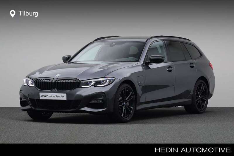 Grijs, metallic lak Gebruikt 2022 BMW 330 Executive Stationwagen | € 39.880 (Iets duurder) - Afbeelding 1/4