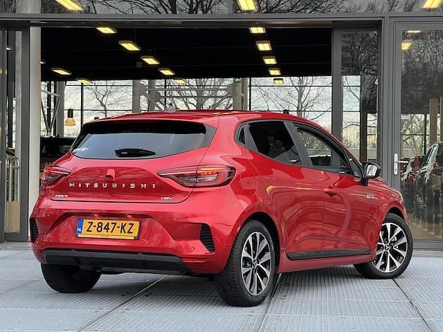 Occasion Mitsubishi Colt Intense 143 PK (105 kW) 2024 Sunrise red (nnp) Hatchback