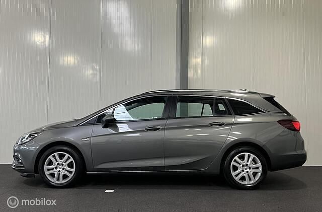 Occasion Opel Astra 110 PK (80 kW) 2017 Grijs (metallic) Stationwagen