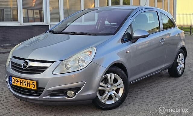Grijs Gebruikt 2009 Opel Corsa Business Hatchback | € 2.999 (Goede deal) - Afbeelding 1/4