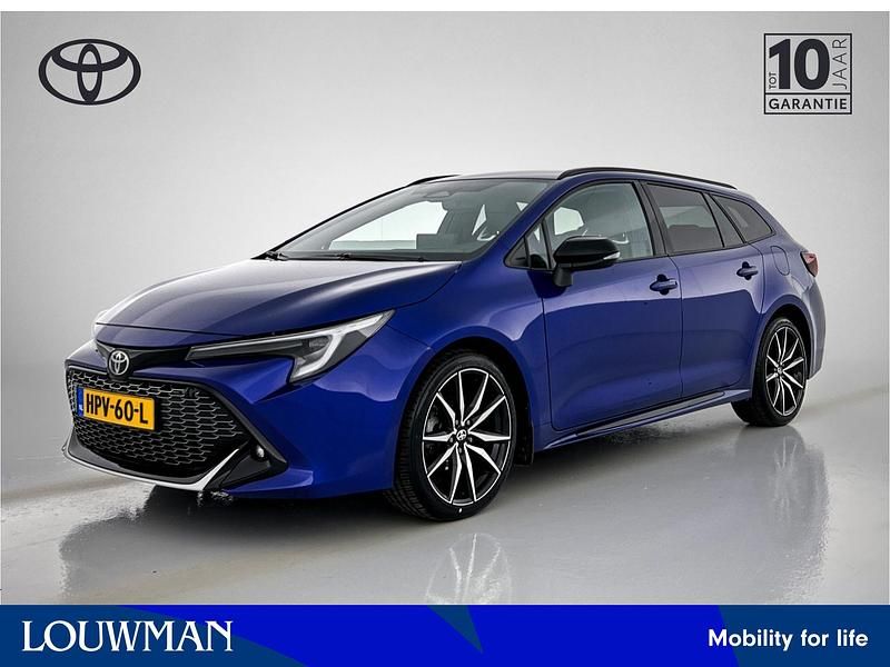 Occasion Toyota Corolla Hybrid Limited 2023 Blauw Stationwagen