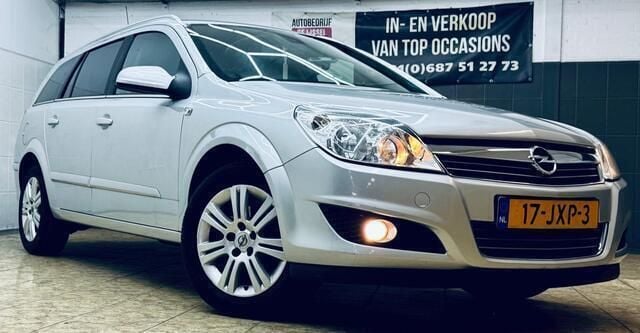 Grijs Gebruikt 2009 Opel Astra Cosmo Stationwagen | € 2.745 (Eerlijke prijs) - Afbeelding 1/4