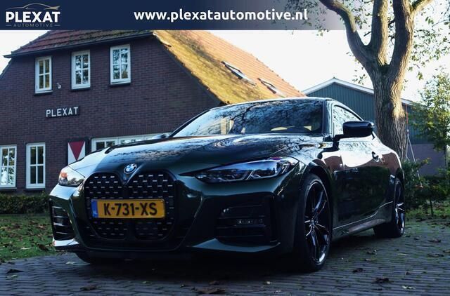 Groen, metallic lak Gebruikt 2021 BMW 420 Executive Coupé | € 36.945 (Eerlijke prijs) - Afbeelding 1/4