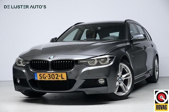 Grijs Gebruikt 2018 BMW 320 Executive Stationwagen | € 17.945 (Super prijs) - Afbeelding 1/4