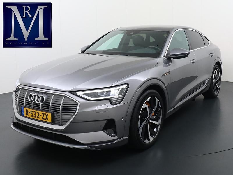 Grijs Gebruikt 2022 Audi e-tron Advanced SUV | € 34.877 (Eerlijke prijs) - Afbeelding 1/4