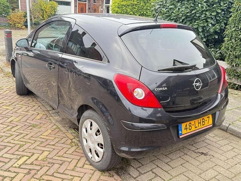 Zwart Gebruikt 2010 Opel Corsa Edition Hatchback | € 1.100 (Super prijs) - Afbeelding 1/4