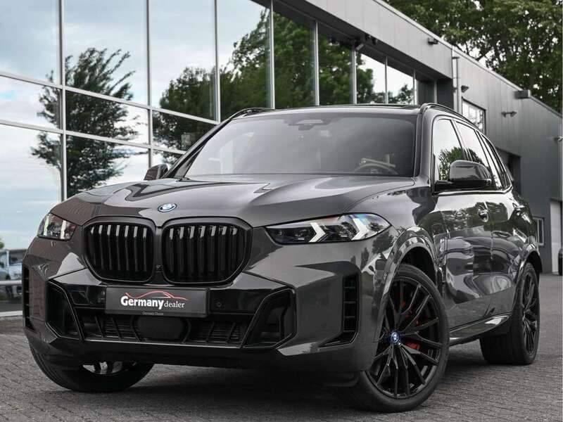 Grijs, metallic lak Gebruikt 2023 BMW X5 M Sport SUV | € 99.949 (Eerlijke prijs) - Afbeelding 1/4