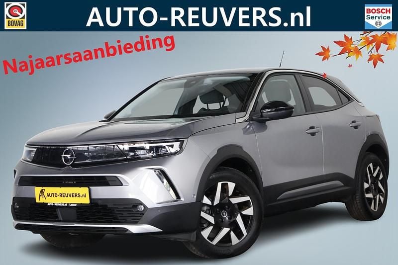 Grijs Gebruikt 2022 Opel Mokka-e Elegance SUV | € 19.900 (Eerlijke prijs) - Afbeelding 1/4