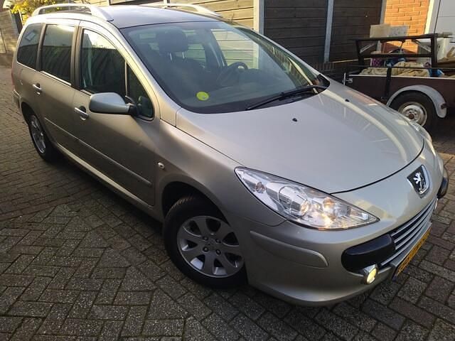 Grijs Gebruikt 2007 Peugeot 307 Stationwagen | € 1.499 (Eerlijke prijs) - Afbeelding 1/4
