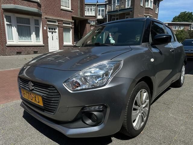 Grijs Gebruikt 2017 Suzuki Swift Hatchback | € 8.450 (Eerlijke prijs) - Afbeelding 1/4