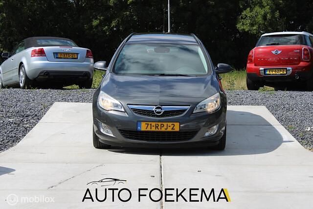 Grijs Gebruikt 2011 Opel Astra Edition Stationwagen | € 2.999 (Goede deal) - Afbeelding 1/4