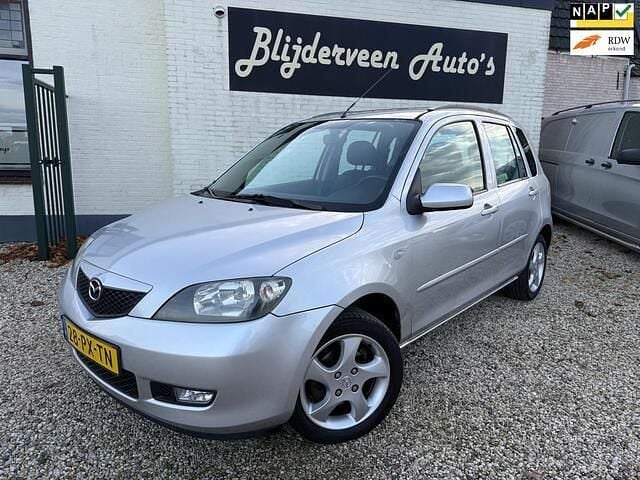 Grijs (metallic) Gebruikt 2005 Mazda 2 Exclusive MPV | € 2.750 (Iets duurder) - Afbeelding 1/4