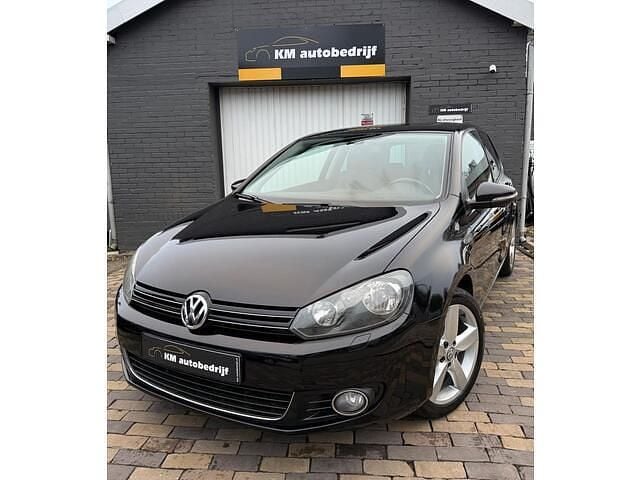 Zwart Gebruikt 2012 VW Golf VII Highline Hatchback | € 7.099 (Goede deal) - Afbeelding 1/4