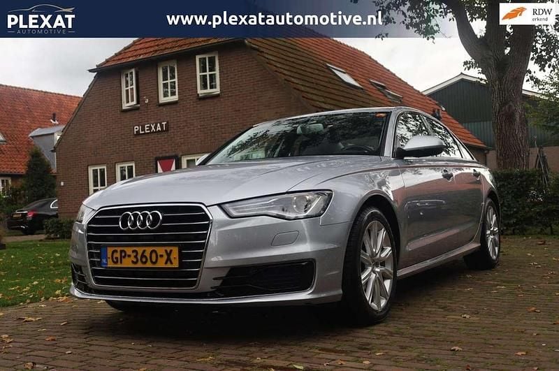 Grijs Occasion 2015 Audi A6 Premium Sedan | € 15.945 - Afbeelding 1/4