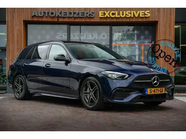 Blauw Gebruikt 2023 Mercedes C300e AMG line Stationwagen | € 46.900 (Eerlijke prijs) - Afbeelding 1/4