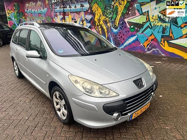Grijs Gebruikt 2007 Peugeot 307 Premium Stationwagen | € 1.495 (Eerlijke prijs) - Afbeelding 1/4