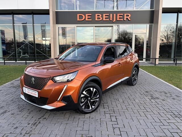 Oranje (metallic) Occasion 2022 Peugeot e-2008 Allure SUV | € 15.950 (Super prijs) - Afbeelding 1/4