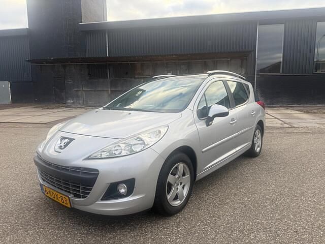 Grijs Gebruikt 2012 Peugeot 207 Active Stationwagen | € 1.950 (Goede deal) - Afbeelding 1/4