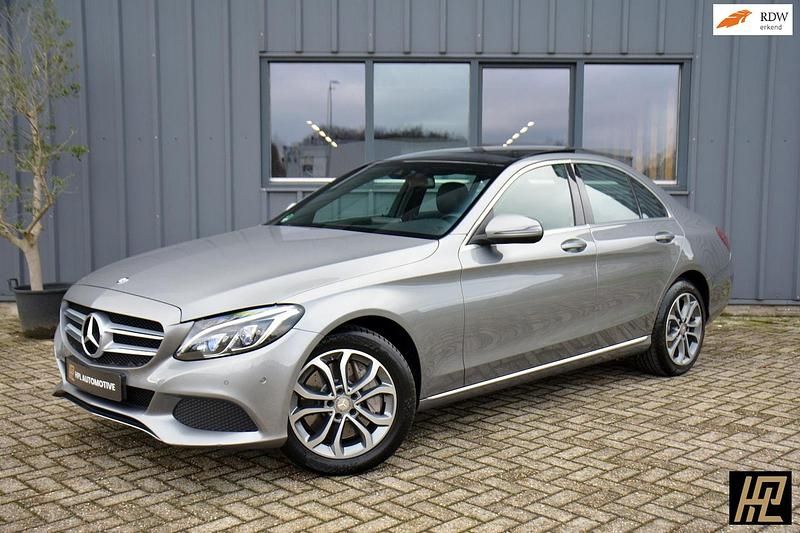 Grijs Gebruikt 2015 Mercedes C350e Edition Sedan | € 16.450 (Eerlijke prijs) - Afbeelding 1/4