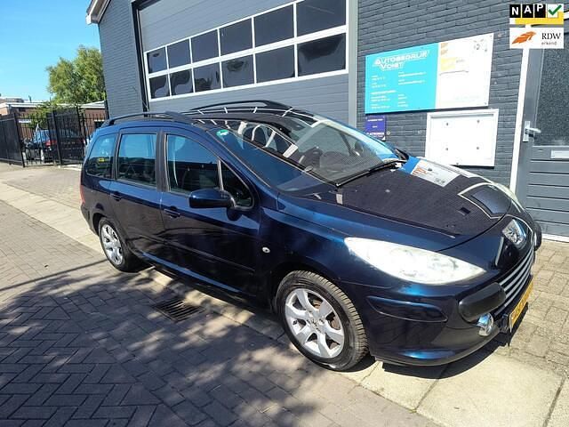 Blauw Gebruikt 2007 Peugeot 307 Premium Stationwagen | € 1.500 (Eerlijke prijs) - Afbeelding 1/4