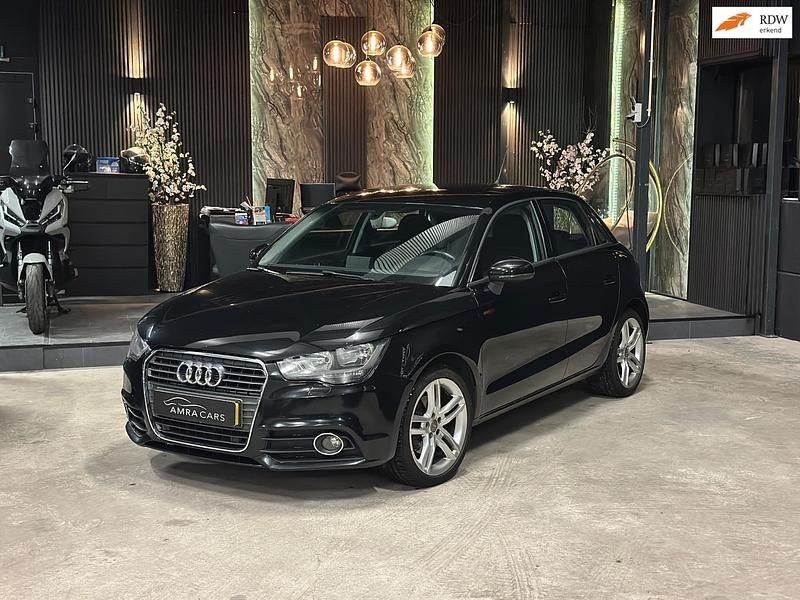 Zwart Gebruikt 2012 Audi A1 Attraction Hatchback | € 10.500 (Eerlijke prijs) - Afbeelding 1/4