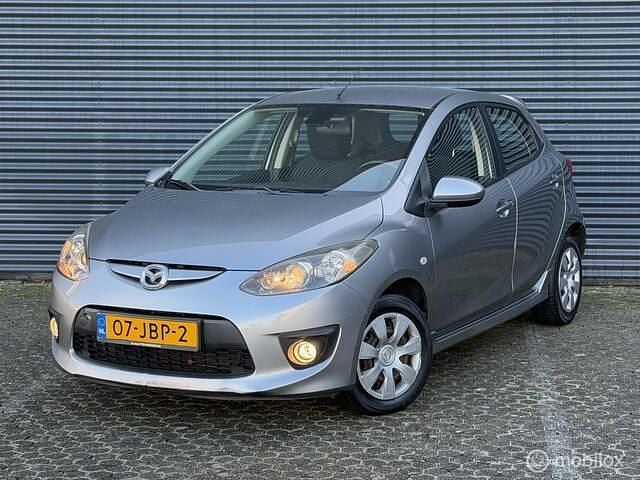 Grijs Occasion 2009 Mazda 2 Edition Hatchback | € 3.750 (Eerlijke prijs) - Afbeelding 1/4