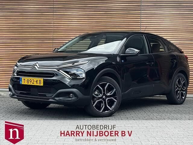 Zwart, metallic lak Gebruikt 2023 Citroën e-C4 Feel SUV | € 18.400 (Goede deal) - Afbeelding 1/4