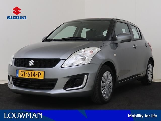 Grijs Occasion 2015 Suzuki Swift Comfort Hatchback | € 8.745 (Eerlijke prijs) - Afbeelding 1/4