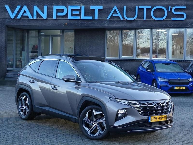 Bruin (metallic) Occasion 2022 Hyundai Tucson Premium SUV | € 26.900 (Super prijs) - Afbeelding 1/4