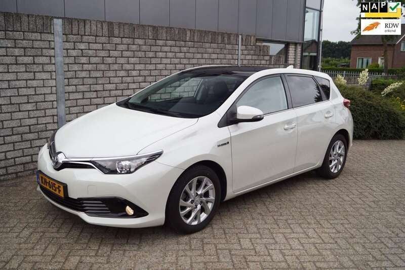 Wit, metallic lak Gebruikt 2016 Toyota Auris Hybrid Trend Hatchback | € 13.850 (Eerlijke prijs) - Afbeelding 1/4