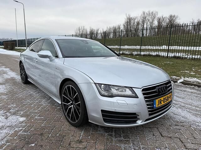 Grijs Occasion 2012 Audi A7 Sportback Proline Hatchback | € 12.950 (Eerlijke prijs) - Afbeelding 1/4