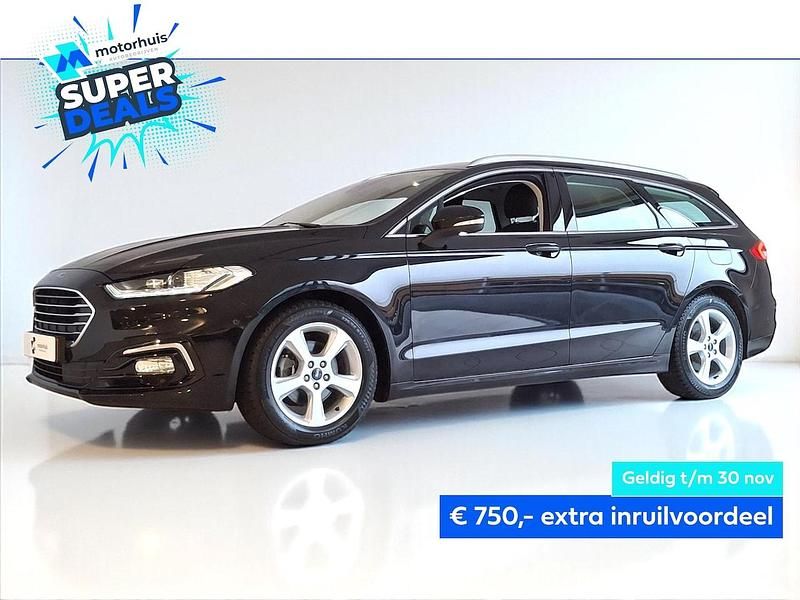 Zwart (metallic) Gebruikt 2022 Ford Mondeo Titanium Stationwagen | € 23.445 (Eerlijke prijs) - Afbeelding 1/4