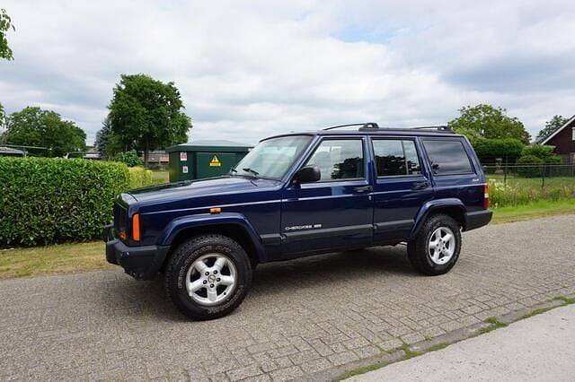 Blauw Gebruikt 2000 Jeep Cherokee Sport SUV | € 8.450 - Afbeelding 1/4
