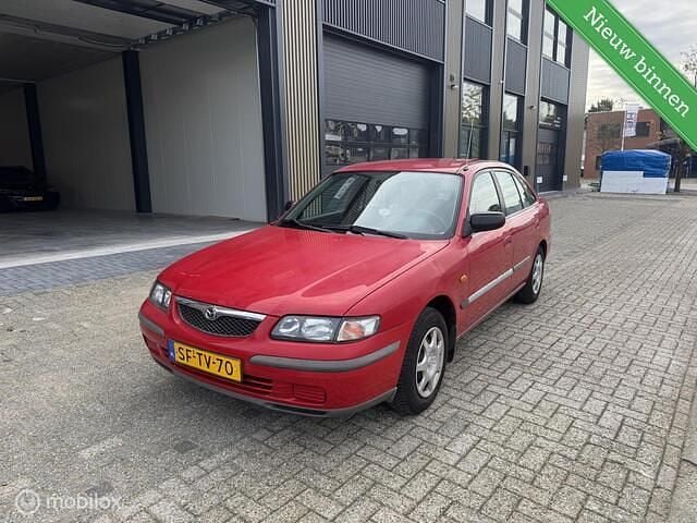 Rood Gebruikt 1997 Mazda 626 Hatchback | € 1.495 - Afbeelding 1/4