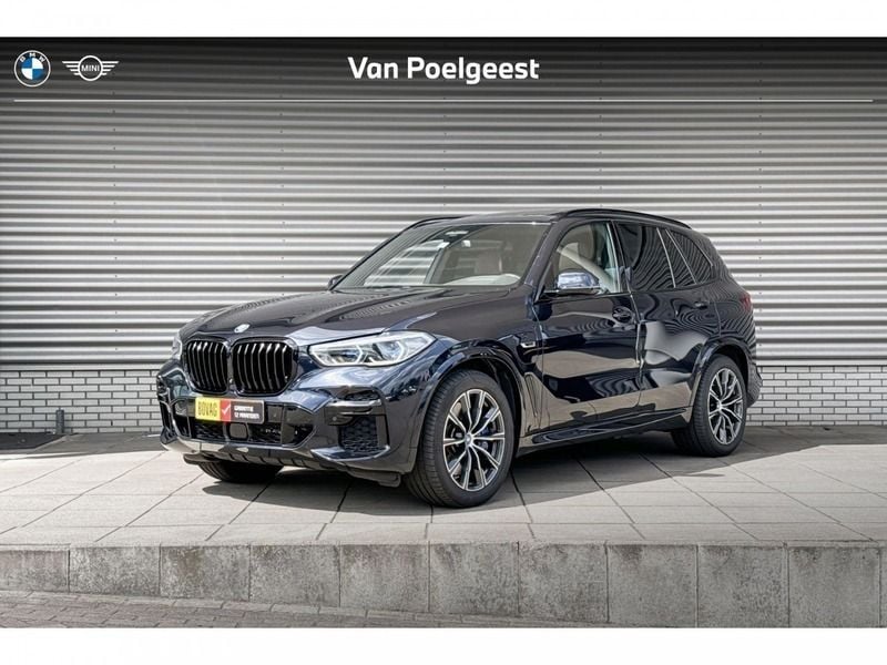 M carbonschwarz Gebruikt 2022 BMW X5 Comfort Edition SUV | € 64.900 (Goede deal) - Afbeelding 1/4
