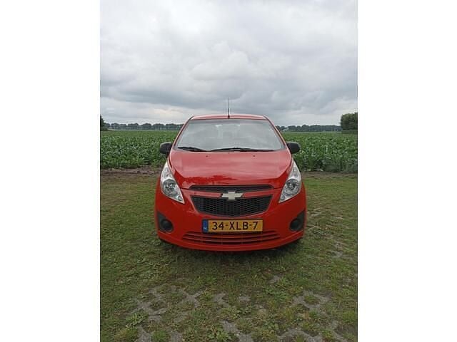 Rood Gebruikt 2012 Chevrolet Spark LS Hatchback | € 3.950 (Iets duurder) - Afbeelding 1/4