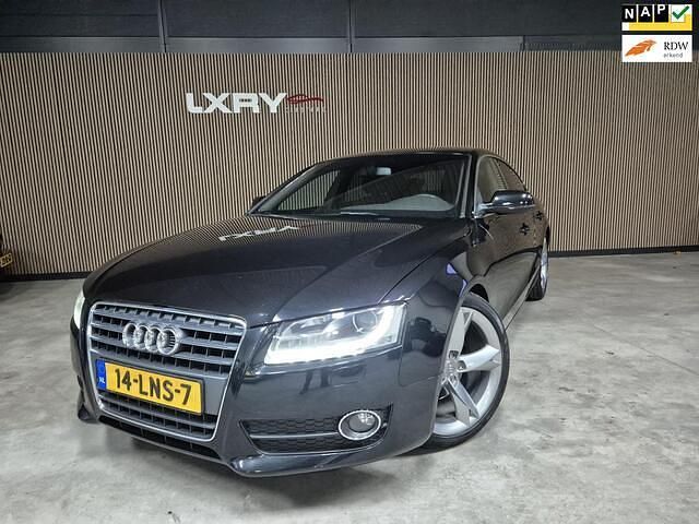 Zwart (metallic) Gebruikt 2010 Audi A5 Sportback Proline Hatchback | € 7.450 (Eerlijke prijs) - Afbeelding 1/4