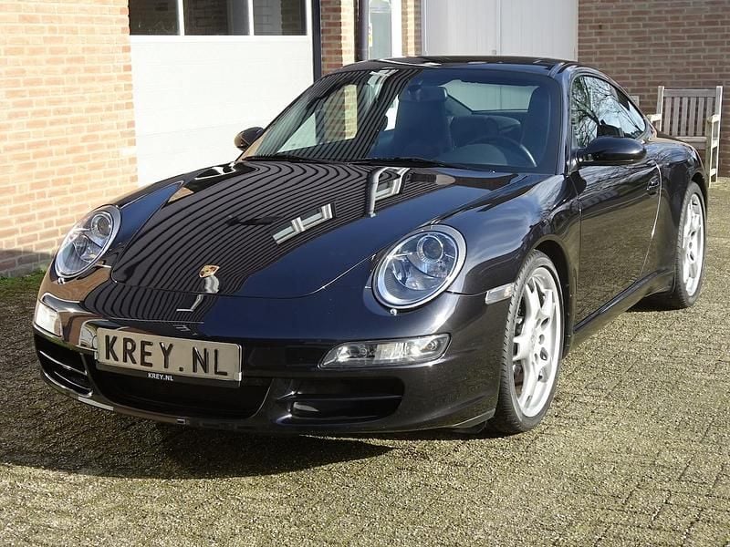 Zwart (metallic) Occasion 2005 Porsche 911 Carrera Coupé | € 47.500 (Duur) - Afbeelding 1/4