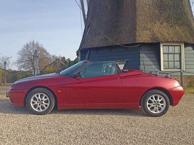 Rood Gebruikt 2000 Alfa Romeo Spider Cabriolet | € 6.500 (Goede deal) - Afbeelding 1/4