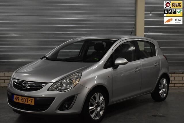 Grijs Occasion 2011 Opel Corsa Cosmo Hatchback | € 6.450 (Eerlijke prijs) - Afbeelding 1/4