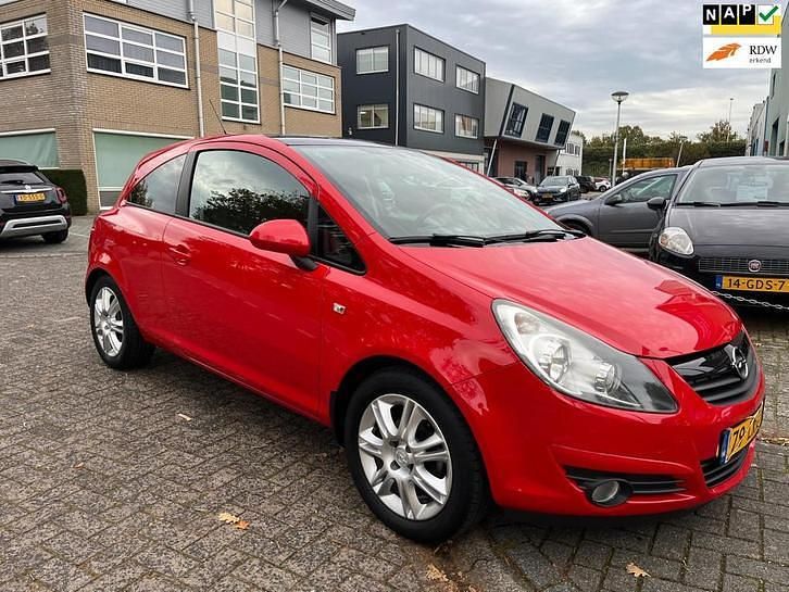 Rood Gebruikt 2010 Opel Corsa Color Edition Hatchback | € 2.795 (Goede deal) - Afbeelding 1/4