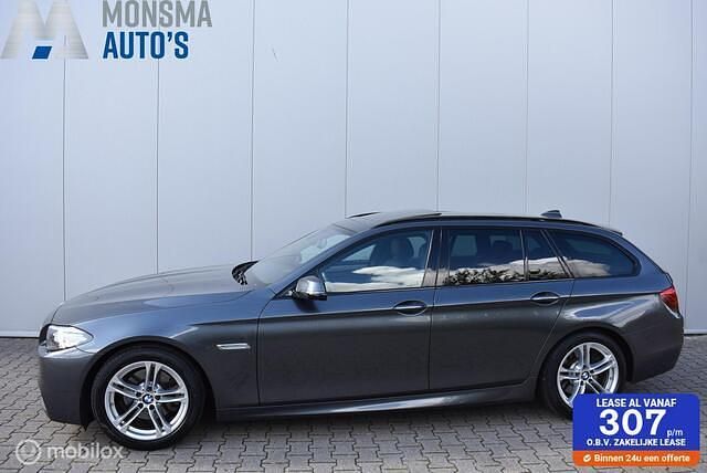 Grijs Gebruikt 2016 BMW 520 M Sport Stationwagen | € 18.475 (Eerlijke prijs) - Afbeelding 1/4