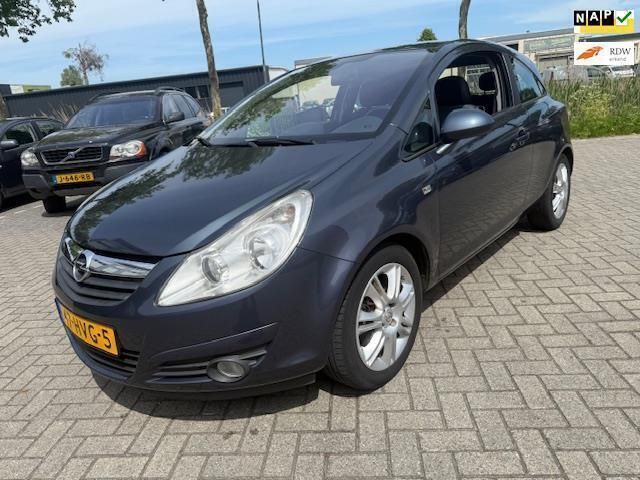 Grijs Occasion 2009 Opel Corsa Cosmo Hatchback | € 3.999 (Eerlijke prijs) - Afbeelding 1/4