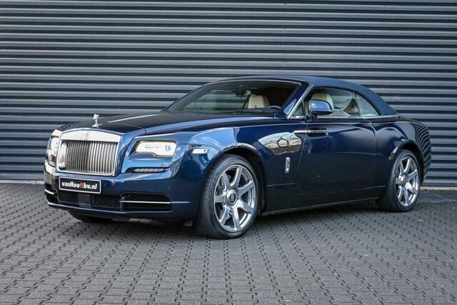 Blauw, metallic lak Gebruikt 2016 Rolls Royce Dawn Cabriolet | € 299.900 - Afbeelding 1/4