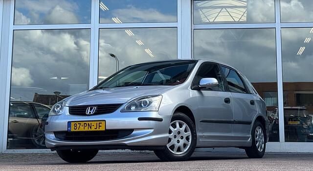 Grijs Gebruikt 2004 Honda Civic LS Hatchback | € 3.744 (Iets duurder) - Afbeelding 1/4
